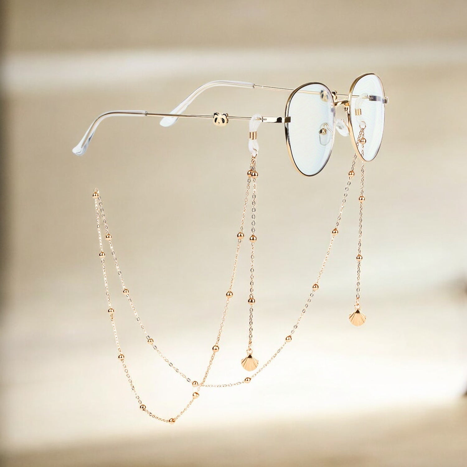 Laroche™ | Chaîne de Lunettes Dorée avec Breloques – Élégante et Raffinée