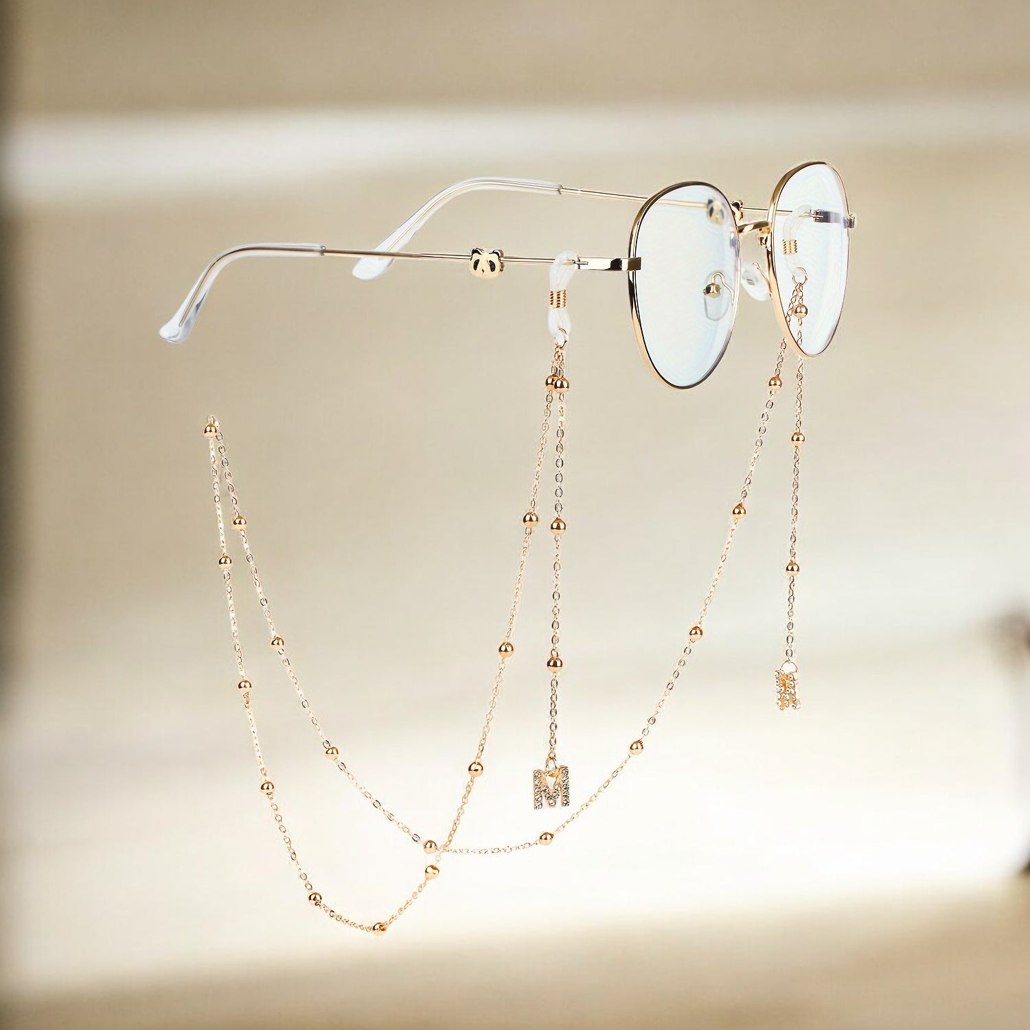 Laroche™ | Chaîne de Lunettes Dorée avec Breloques – Élégante et Raffinée